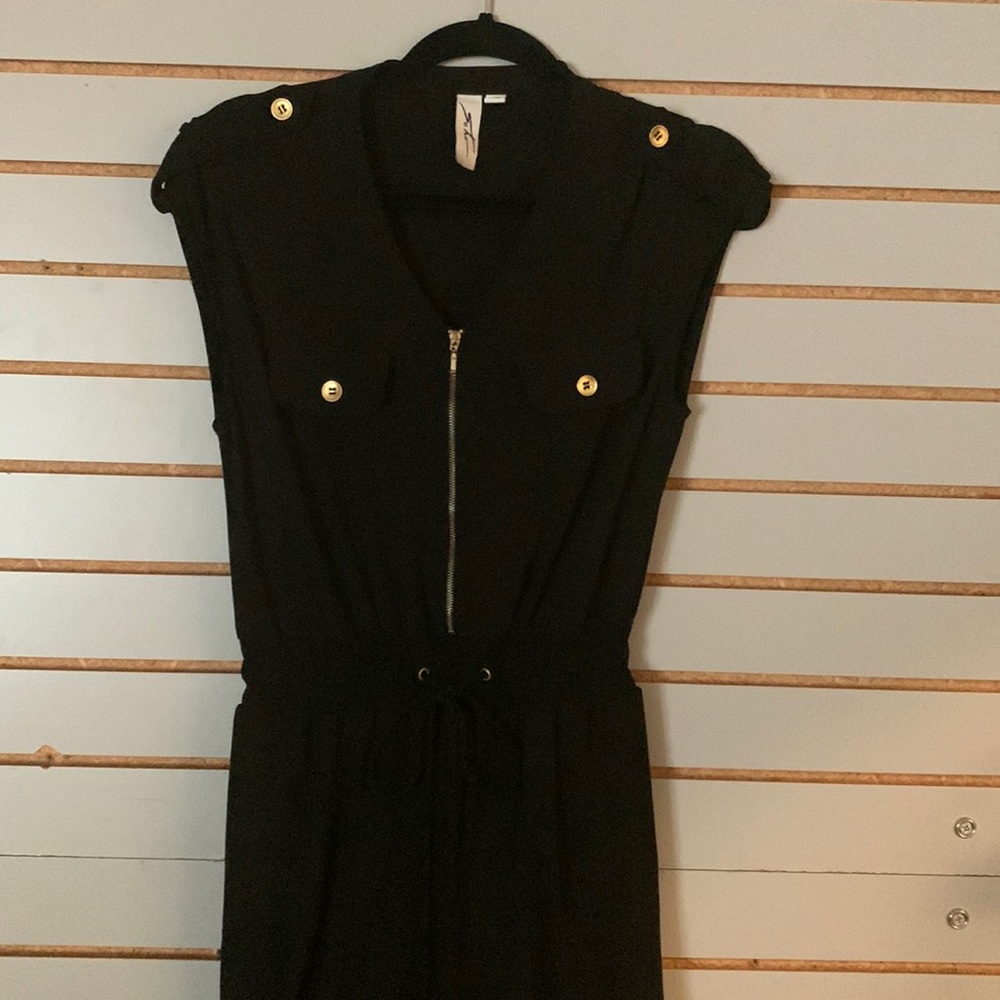 Black classic pantsuit w gold detail. Stately & smart yet flows like a river. S